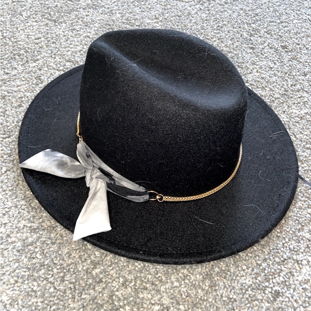 black fedora with ribbon and gold chain